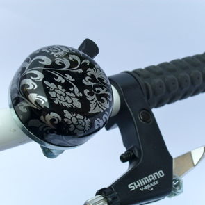 Fahrradklingel Fahrradklingel Blumenwiese silber auf schwarzem Grund